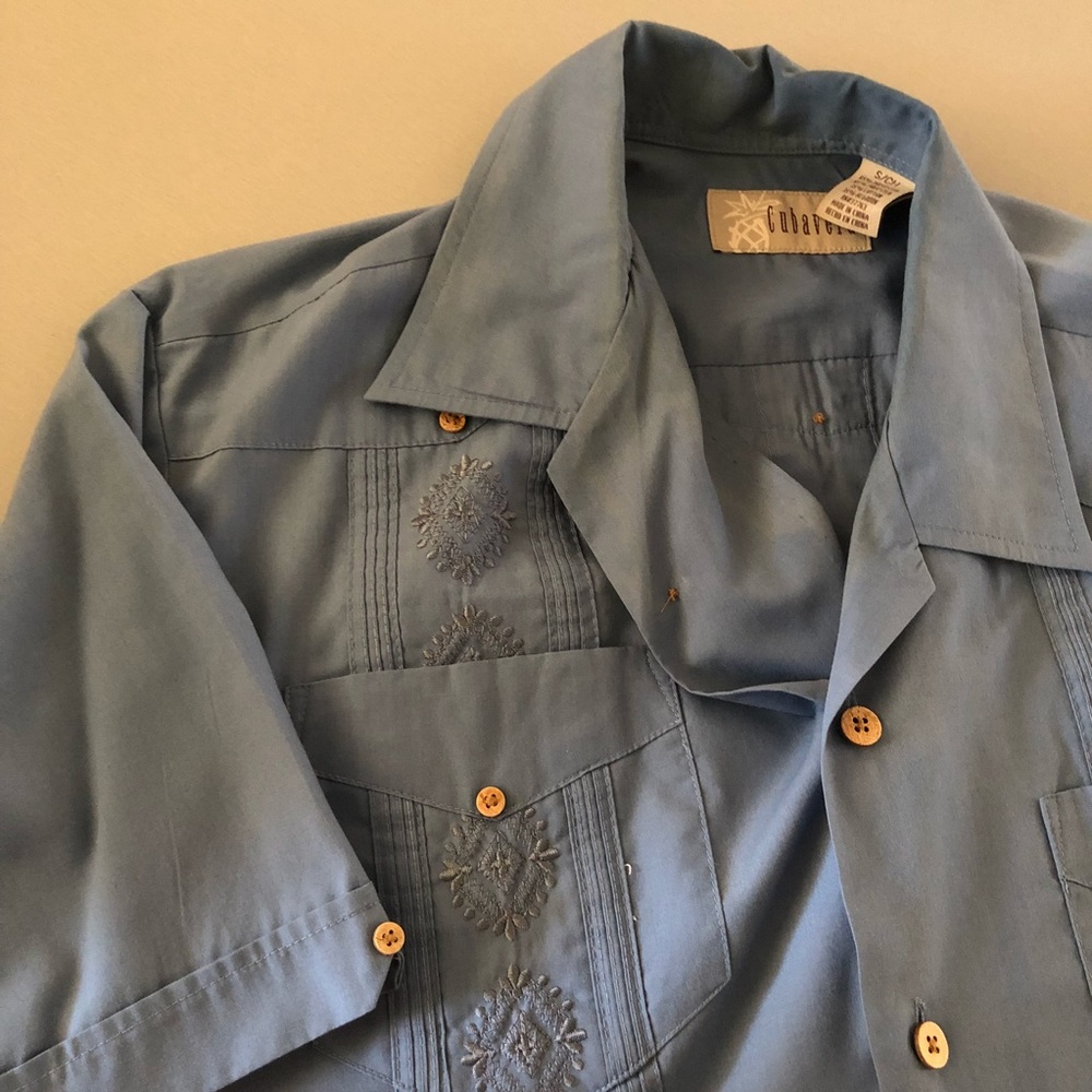 Light/med blue Guayavera shirt.